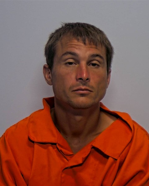 Booking photo of Cameron Michael Norman