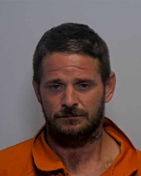 Booking photo of Charles Otto Romine