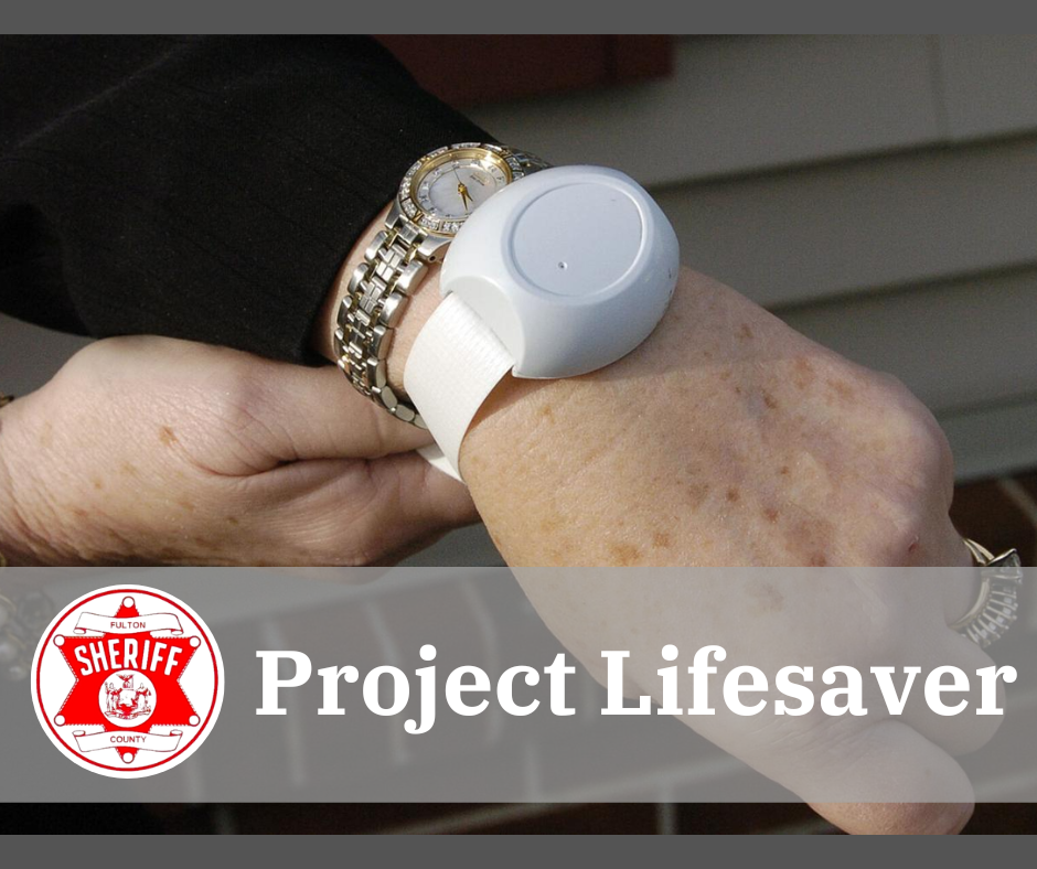 Project Lifesaver - a white, watch-sized transmitter attached to a person's wrist