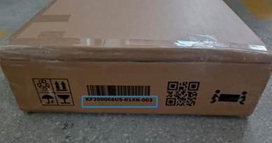 A cardboard box with a barcode of KF200066US-61XN-003